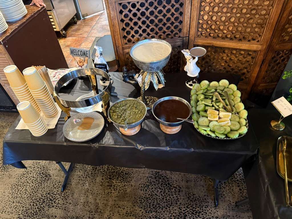 Indian and Pakistani catering trays from Urban Punjab at a family gathering