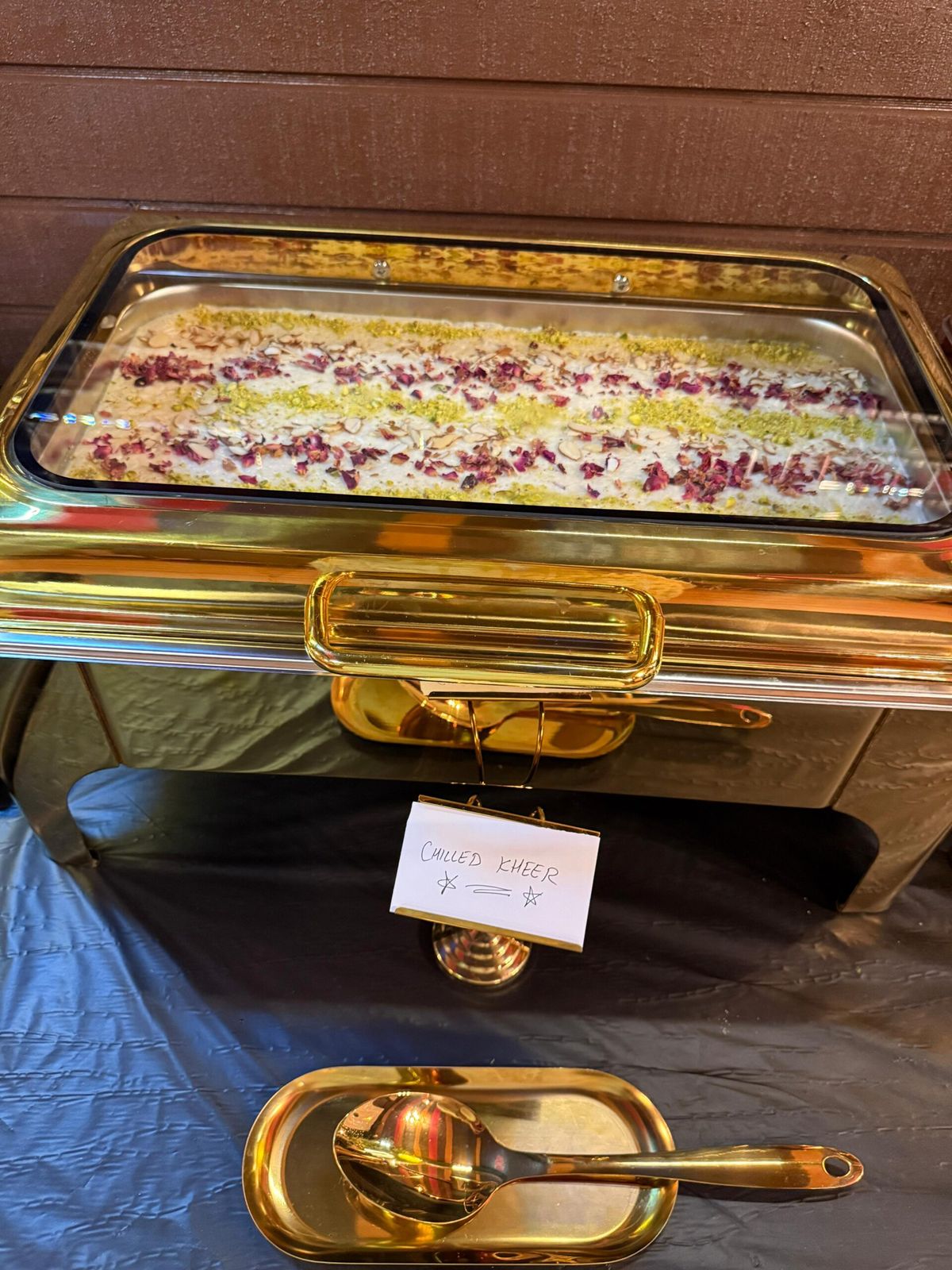 Guests serving from Urban Punjab catering platters